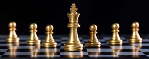 gold and silver chess on the black background